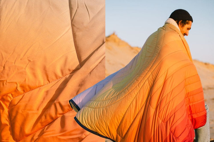Couverture CloudTouch® matelassée avec col sherpa blanc doux, dégradé orange, jaune, bleu clair et violet